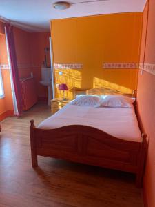 Postel nebo postele na pokoji v ubytování L'Hôtel du Mouton blanc