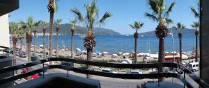 a view of the beach from the balcony of a resort at Candan Citybeach Hotel in Marmaris