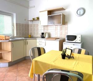 Kuchyň nebo kuchyňský kout v ubytování Apartment Medulin 37