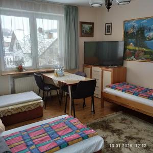Posteľ alebo postele v izbe v ubytovaní Homestay Stróżówka