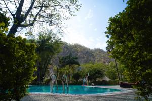 Bazén v ubytování The Solluna Resort nebo v jeho okolí