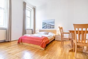 Łóżko lub łóżka w pokoju w obiekcie Simple Apartment near Wiener Stadthalle