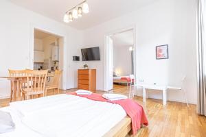 Łóżko lub łóżka w pokoju w obiekcie Simple Apartment near Wiener Stadthalle