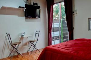 TV a/nebo společenská místnost v ubytování Ruai Thong Pong Pai Resort