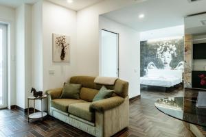 Posezení v ubytování Ram7 Kōfuku Zen Apartment Gallarate