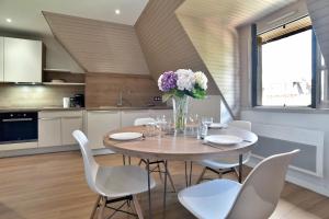 Kuchyň nebo kuchyňský kout v ubytování Emilie 21 - à 200m de la plage + 3 fotografie