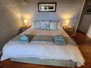 Postel nebo postele na pokoji v ubytování The Beach Retreat