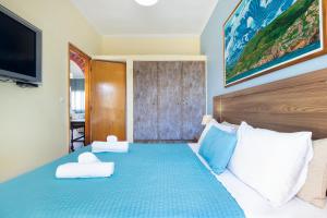 Posteľ alebo postele v izbe v ubytovaní Irini Apartment II