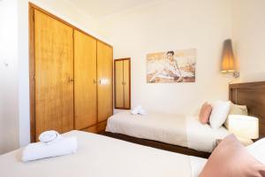 Posteľ alebo postele v izbe v ubytovaní Irini Apartment II