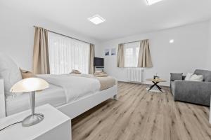 Posteľ alebo postele v izbe v ubytovaní Apartment AnaKatarina