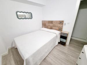 Posteľ alebo postele v izbe v ubytovaní Apartamento 3 dormitorios centro Villajoyosa