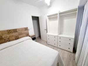 Posteľ alebo postele v izbe v ubytovaní Apartamento 3 dormitorios centro Villajoyosa