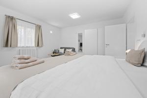 Posteľ alebo postele v izbe v ubytovaní Apartment AnaKatarina