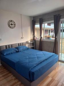 Ένα ή περισσότερα κρεβάτια σε δωμάτιο στο Blakeys' Home
