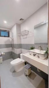 Ένα μπάνιο στο Reveur Apartment