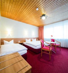 En eller flere senge i et værelse på Nürnberger Trichter