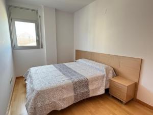 Postel nebo postele na pokoji v ubytování Apartamento Residencial Deltamar