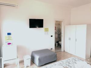 TV a/nebo společenská místnost v ubytování Tanzi Home