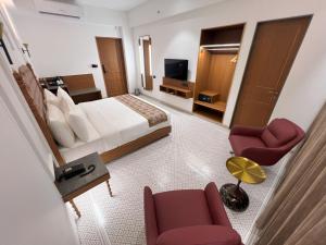 Fotografie z fotogalerie ubytování Haldi Kumkum Resort v destinaci Limodra