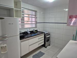 Kuchyň nebo kuchyňský kout v ubytování Sossai Hostel Flats