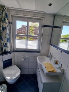 Koupelna v ubytování Hotel Garni Friesenhuus