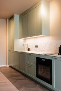 Kuchyň nebo kuchyňský kout v ubytování Reykjavik Residence Apartment Hotel