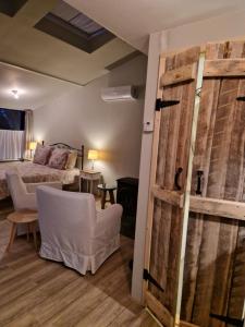 Postel nebo postele na pokoji v ubytování BenB Op de Vleet vrijstaande accommodatie