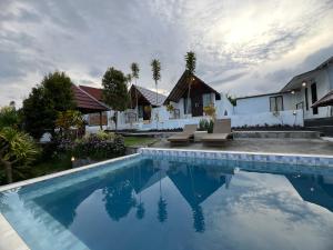 Bazén v ubytování Bukit Catu Bungalows nebo v jeho okolí
