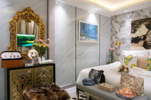 a bedroom with a white bed and a mirror at 2 bedrooms Amani Pool Villa Phuket in Thalang +18 photos