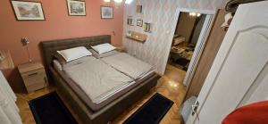 Posteľ alebo postele v izbe v ubytovaní Habos isler apartman 16