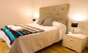 Postel nebo postele na pokoji v ubytování Apartamentos Amaiur