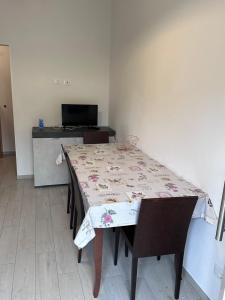 TV a/nebo společenská místnost v ubytování Appartamento Rimini Vacanza