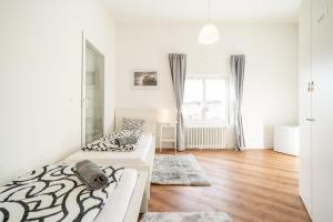Postel nebo postele na pokoji v ubytování Swissholiday