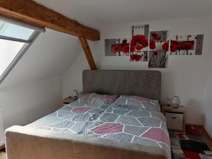 a bedroom with a bed and a window at Ferienwohnung Schack in Bodensdorf