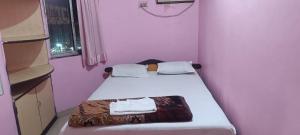 Postel nebo postele na pokoji v ubytování Taiba Guest House - BUDGET&BASIC ROOMS - Near New Market, Esplanade, Dharamatala