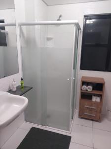Koupelna v ubytování Flat próximo ao Shopping e Praia