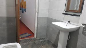 Ένα μπάνιο στο Kingfisher Guesthouse and Hostel