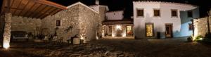 an empty courtyard of a building at night at Puial de l Douro in Miranda do Douro