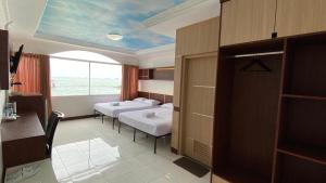 Voodi või voodid majutusasutuse Allisa Resort Hotel toas