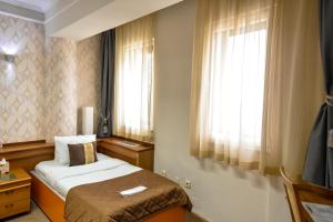 Postel nebo postele na pokoji v ubytování Sole Mio Wellness & SPA
