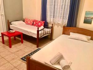 A bed or beds in a room at PLAZA Studios