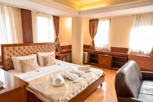 Postel nebo postele na pokoji v ubytování Sole Mio Wellness & SPA