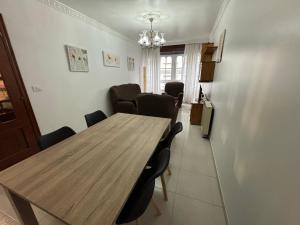 Et opholdsområde på Piso en Ribeira centro by Cristian&Tamara "alquileres"