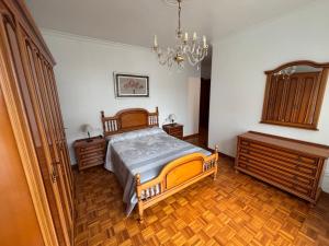 En eller flere senge i et værelse på Piso en Ribeira centro by Cristian&Tamara "alquileres" + 10 billeder