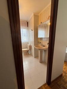 Køkken eller tekøkken på Piso en Ribeira centro by Cristian&Tamara "alquileres"