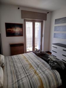Postel nebo postele na pokoji v ubytování la dimora del re