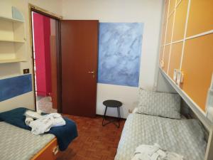 Postel nebo postele na pokoji v ubytování la dimora del re
