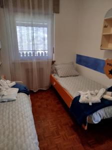 Postel nebo postele na pokoji v ubytování la dimora del re