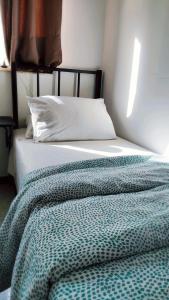 Tempat tidur dalam kamar di Le 3 isole