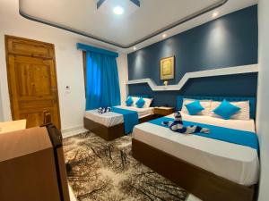 Postel nebo postele na pokoji v ubytování Seaview Hotel Dahab